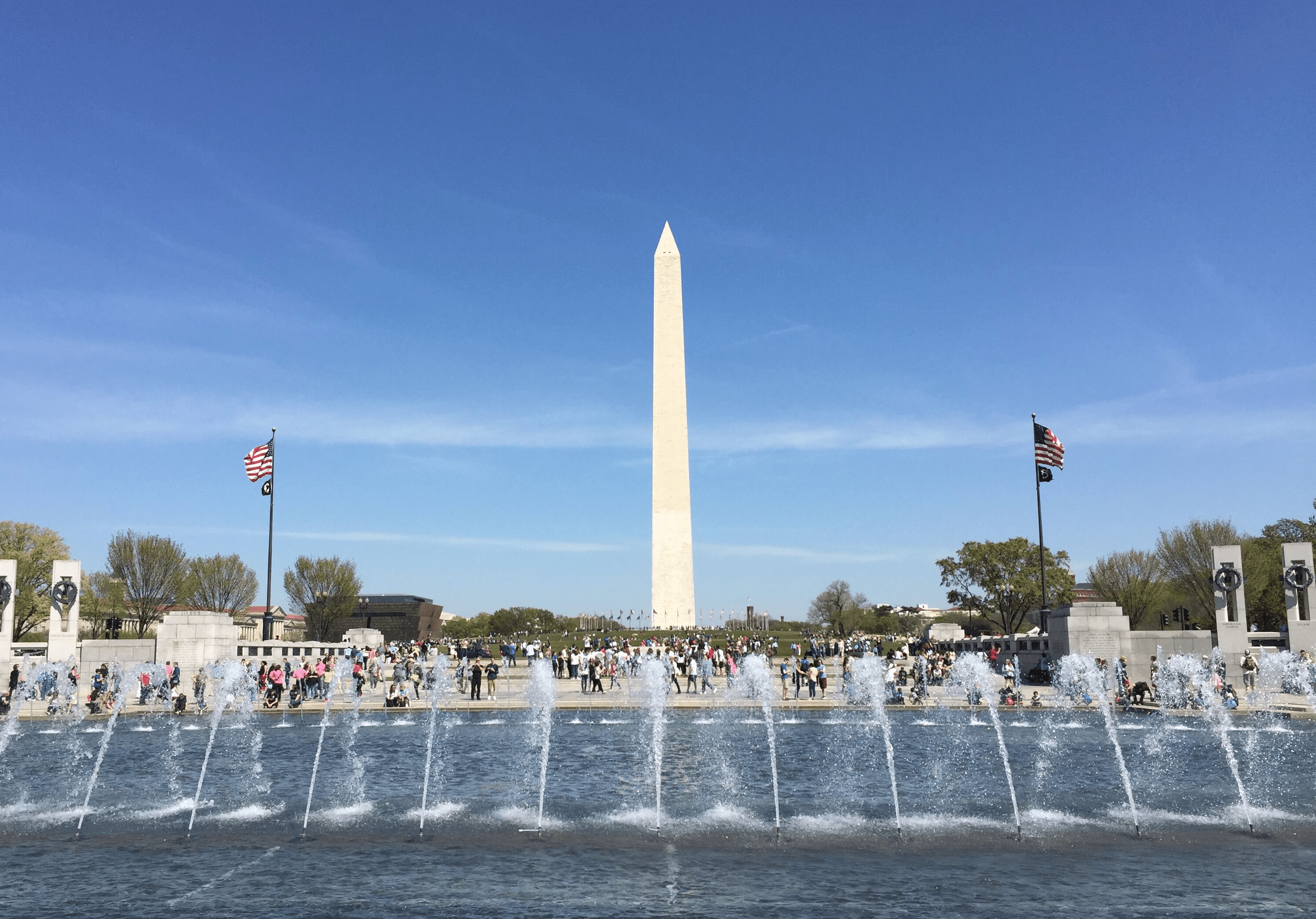 Photo of Washington Monument in Washington, D.C. Fountain in foreground.